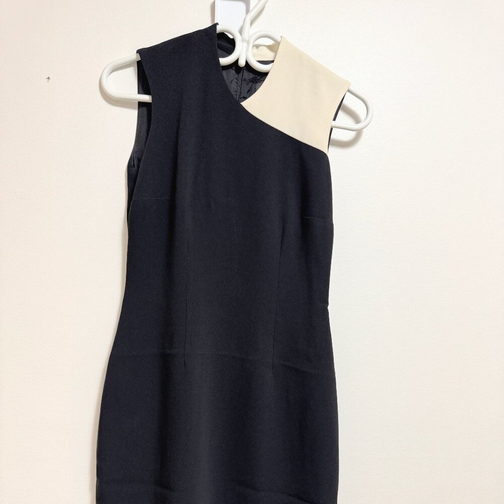 Black dress with white shoulder